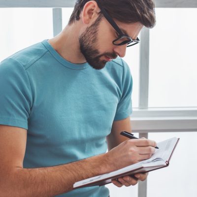 Handsome man with book